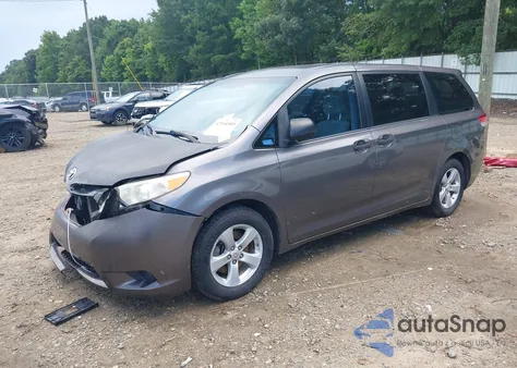 2011 Toyota Sienna Base V6 z USA, uszkodzony, nr VIN 5TDZK3DC7BS004067